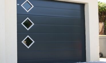 Portes de garage &agrave;&nbsp;GRANDCHAMPS DES FONTAINES